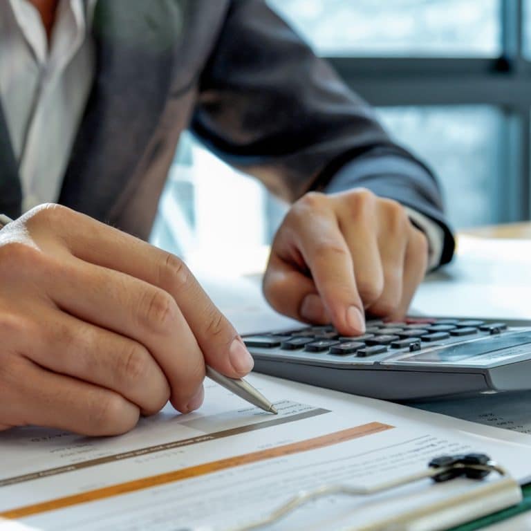 Business concept : Businessmen are analyzing data in the office.