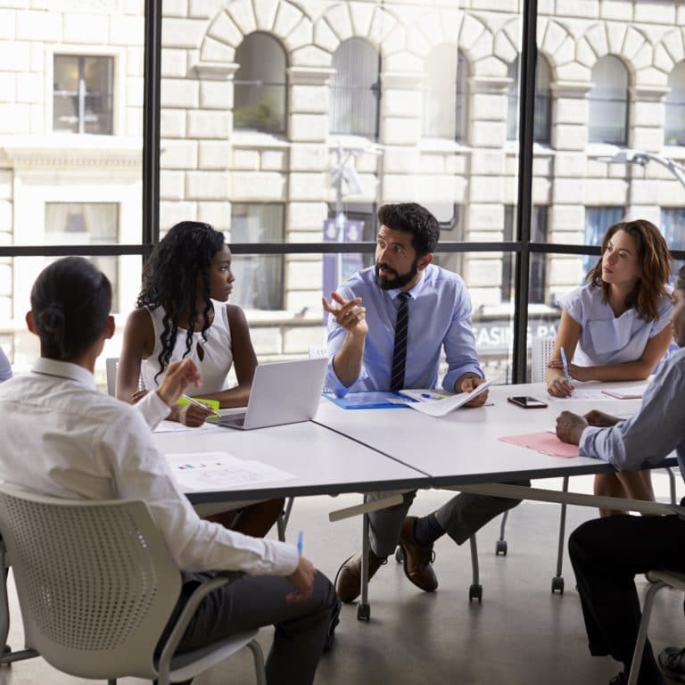 Corporate business team and manager in a meeting, close up