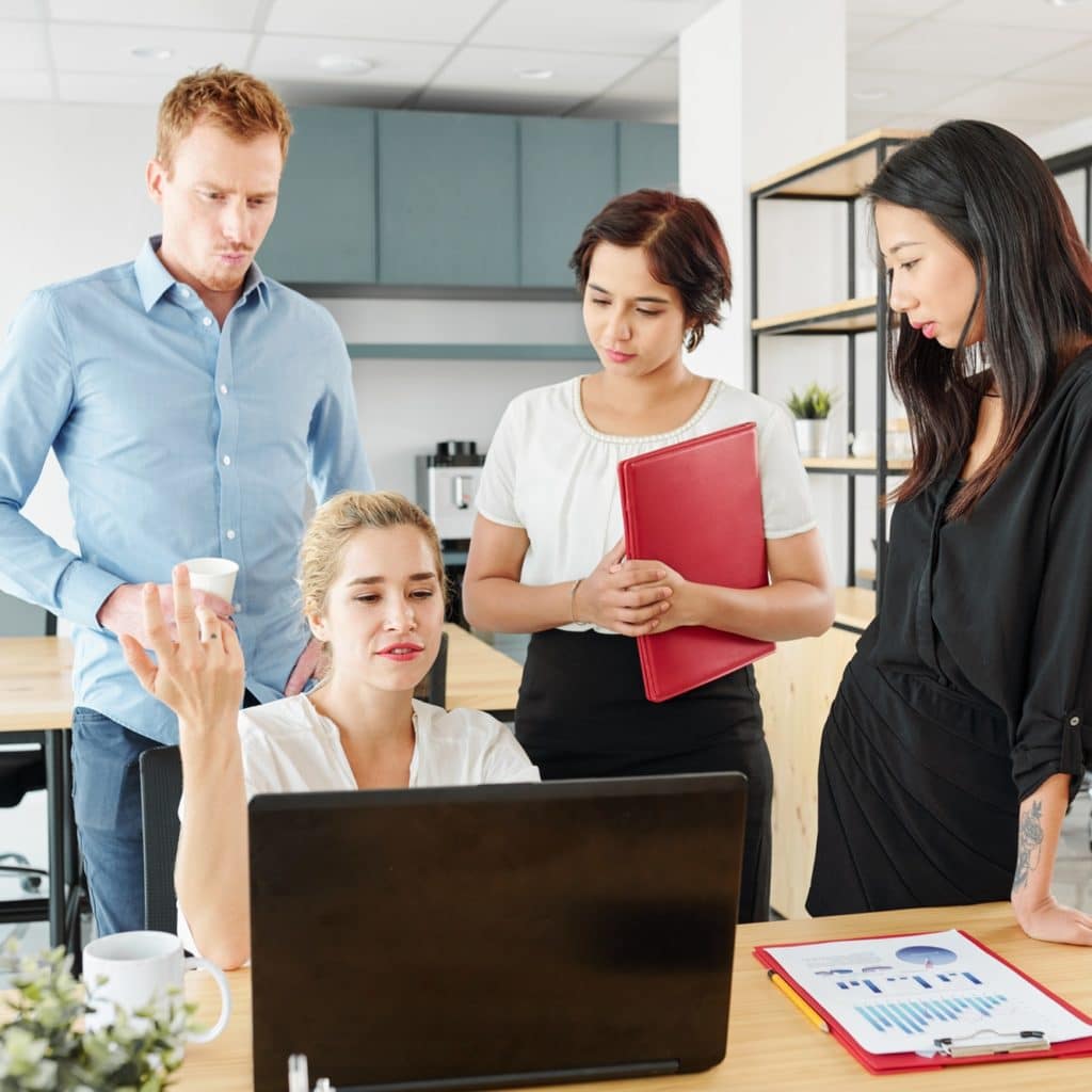 Business colleagues working in team