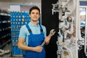 Plumber with wrench
